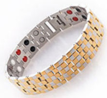 A sliver and gold small blocks Stainless Steel bracelet containing healing magnets